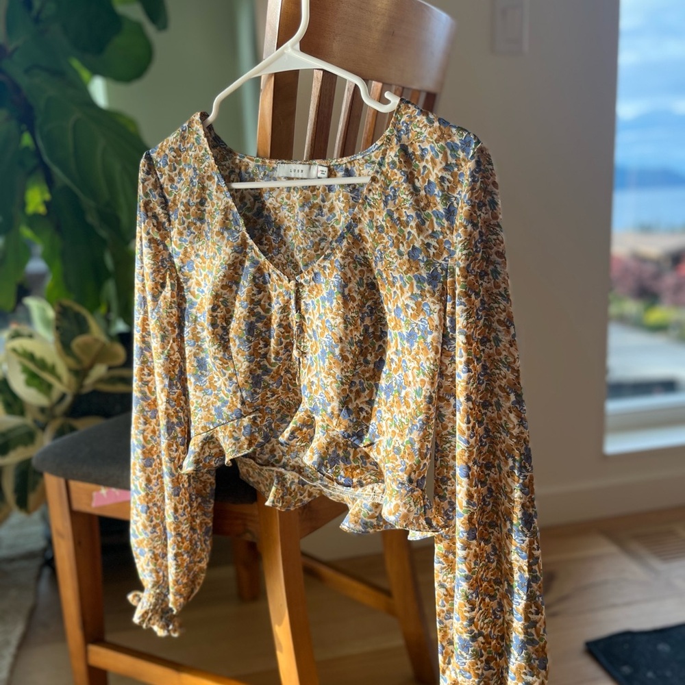 Lush Multicolor Floral Blouse with Ruffle Hem
